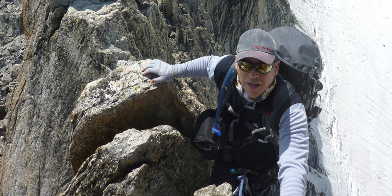 person climbing rocks